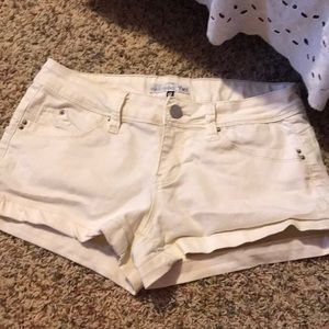 Low rise, off white jean shorts